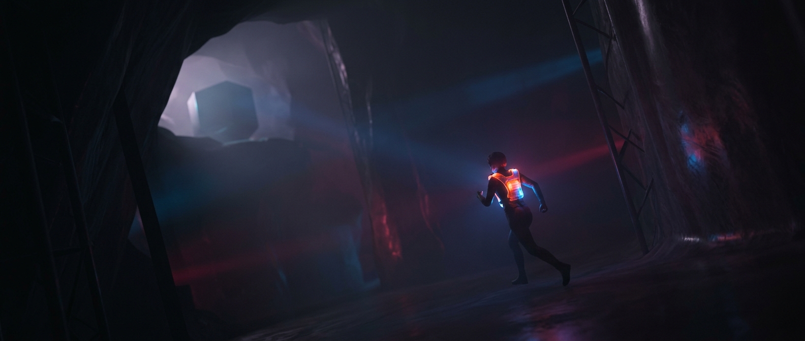 Running around a dark room in a glowing plastic vest